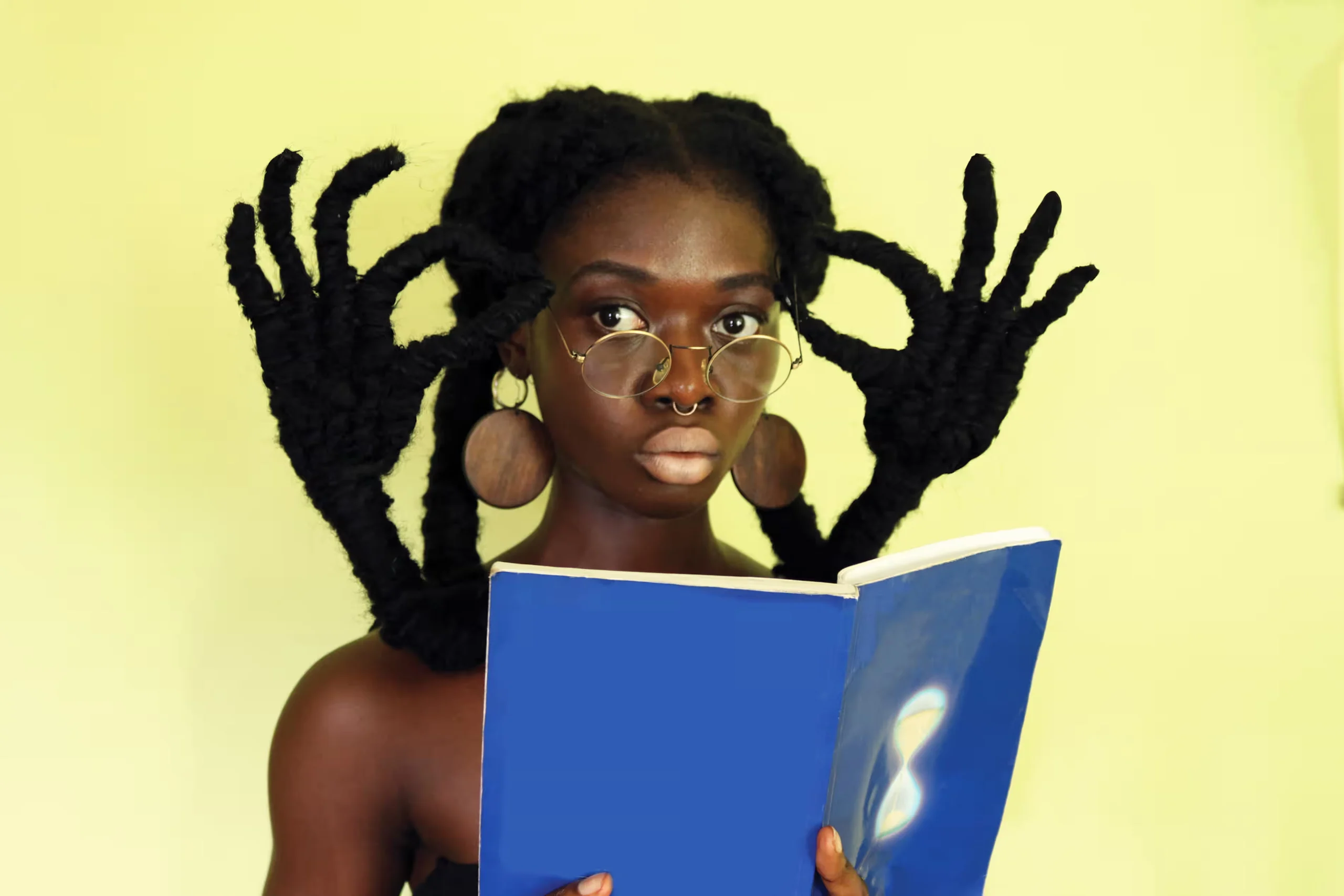 Laetitia Ky: Sculpting Stories with Natural Hairstyles